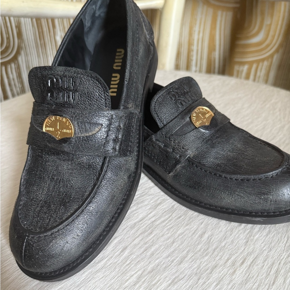 Miu Miu Black vintage Leather womens Loafers 2025 runway shoes